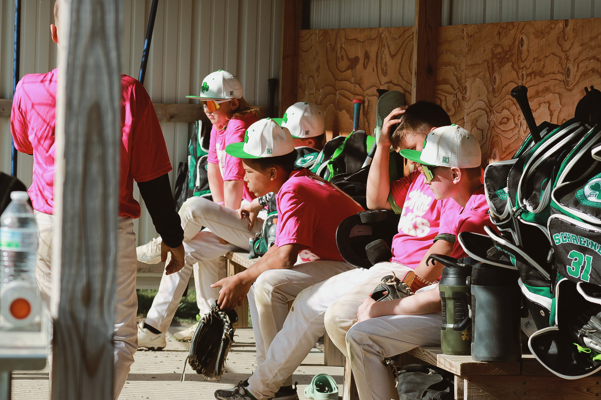 Shamrocks players together in the dugout
