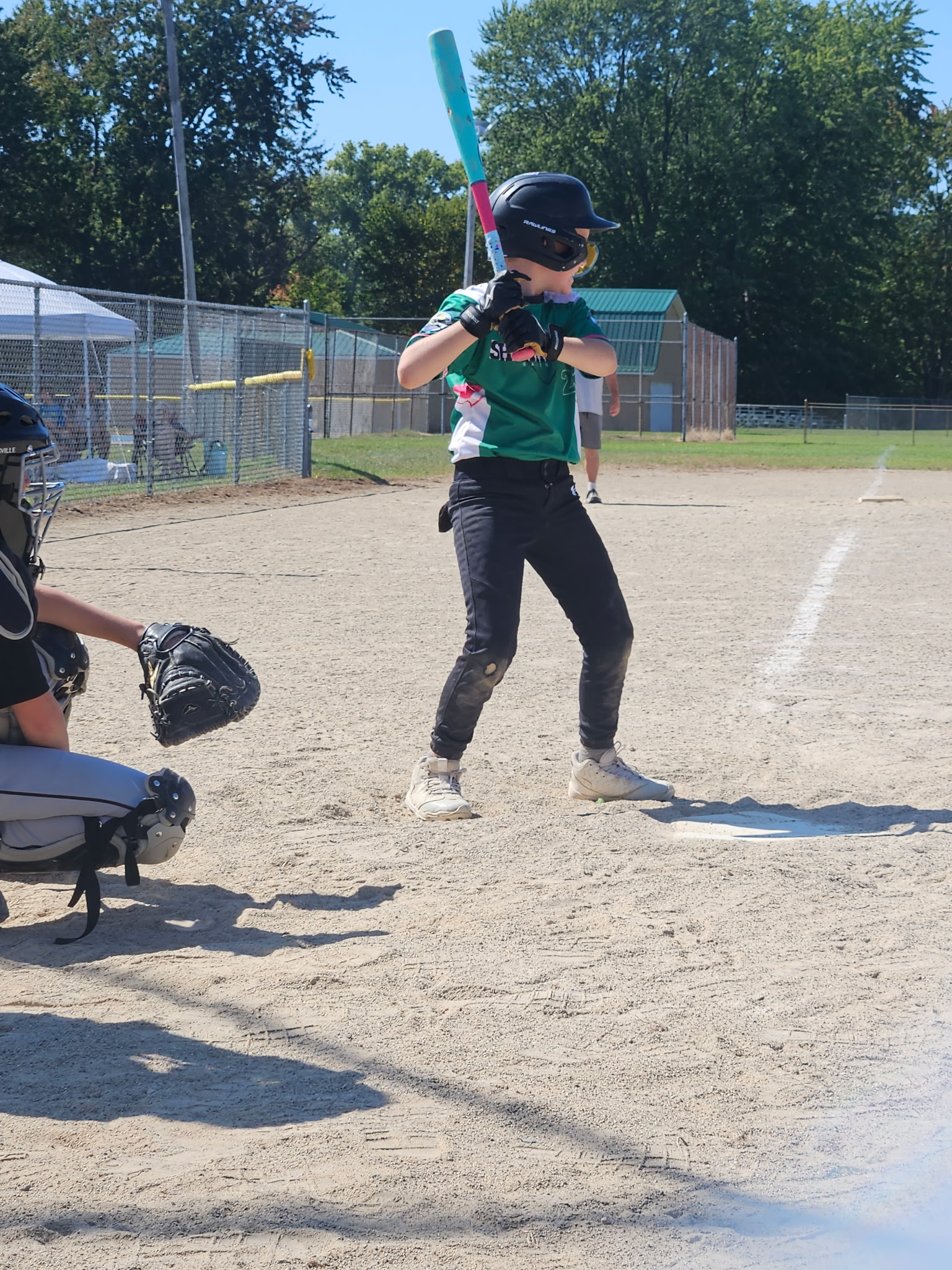 Young Shamrocks player developing hitting fundamentals